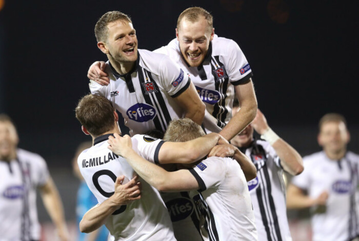 Robbie Benson celebrates his goal with teammates