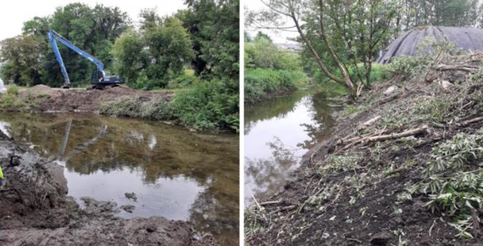 On the left is clay along cleared river banks with a blue digger in the background. On the right cut branches are left on the bank with a tree and domed building in the background.