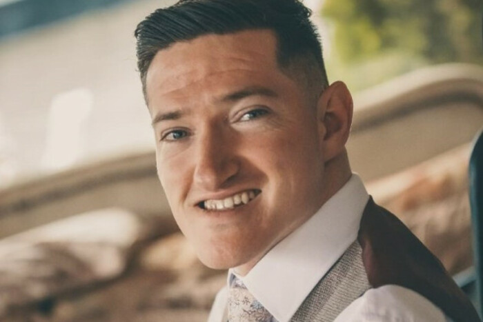 James Cawley wearing a shirt, waistcoat and tie