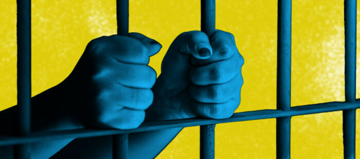 Design for BLIND JUSTICE project - Hands with gripping prison bars