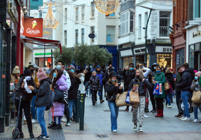 Shoppers holding sales bags on Grafton St on St Stephen's Day